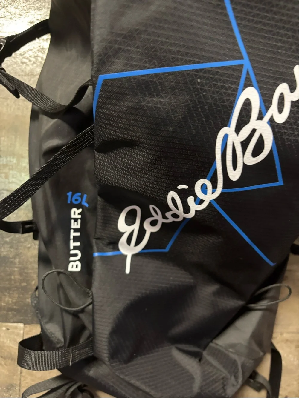 NWT Eddie Bauer Black Butter Pack 16L Backpack with Blue Accents